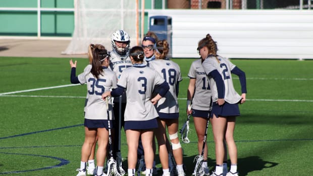 Kyra-Cunningham-Womens-Lacrosse-vs-Michigan-Team-Huddle-scaled